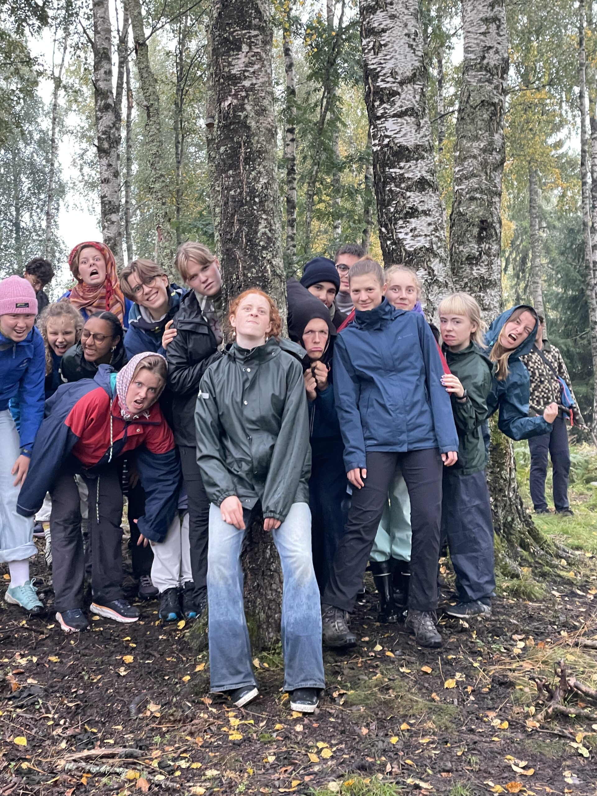 Woman on beach, splashing water.